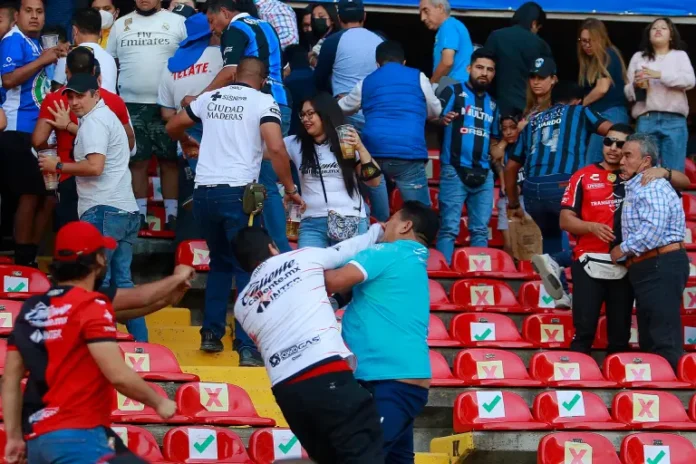 Queretaro and Atlas fans face each other